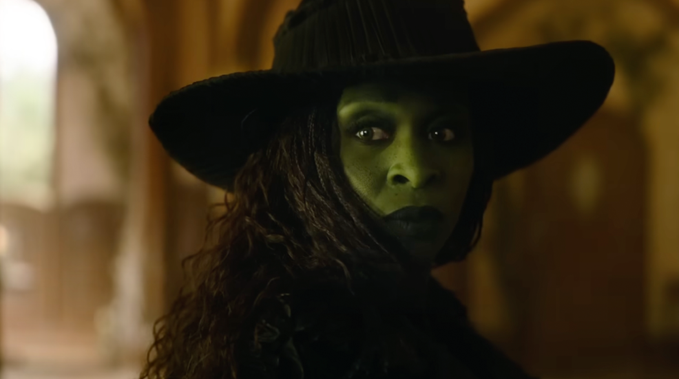 Cynthia Erivo as Elphaba looking over her shoulder in Wicked: For Good